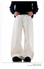White Tapered Leg Jeans
