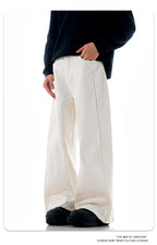 White Tapered Leg Jeans